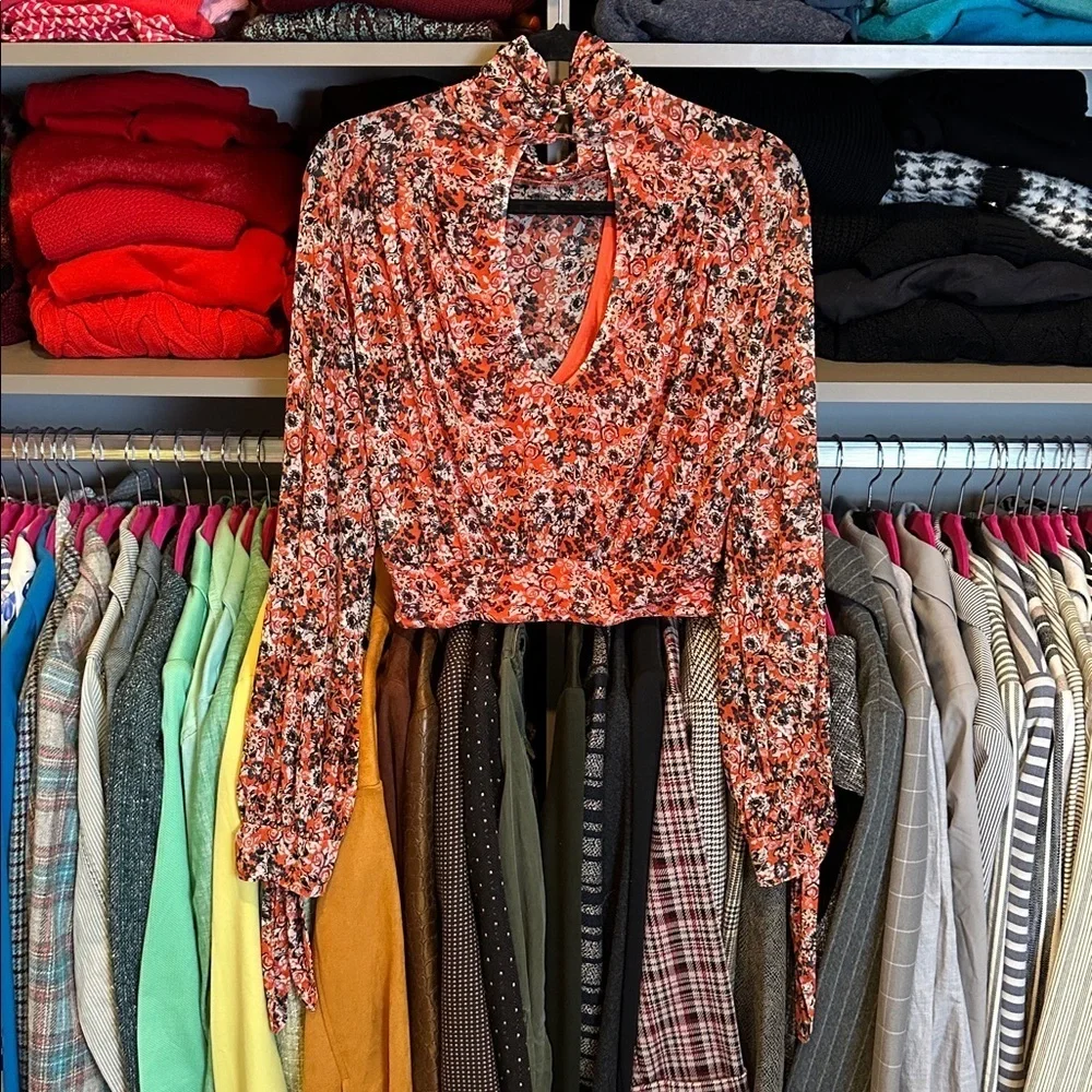Free People orange/black floral long sleeve back button closure crop top size XS